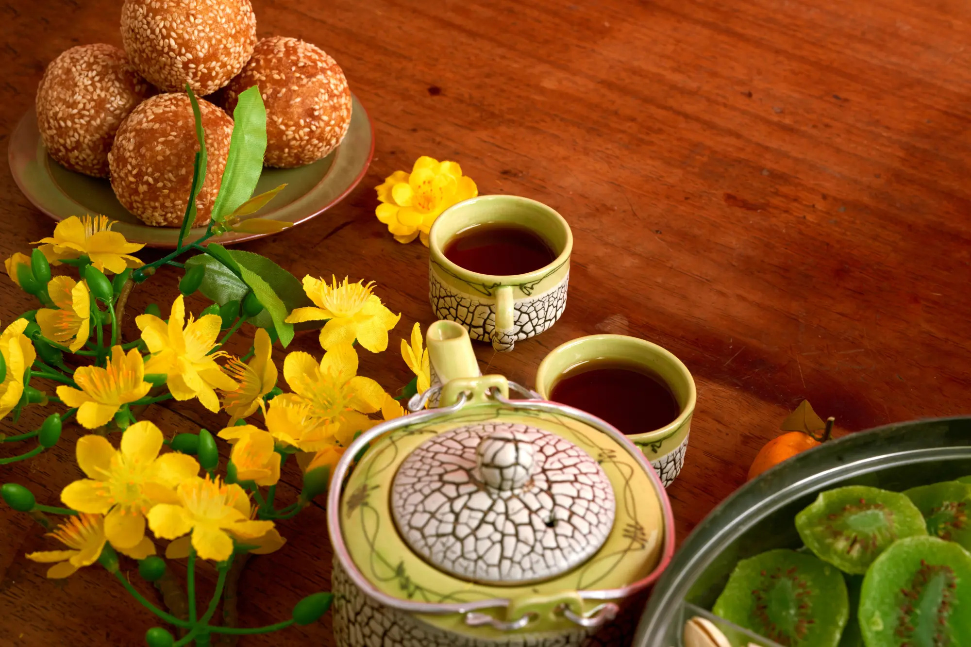 Traditional Vietnamese Tea Set and Snacks
